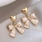 A Little Extra Heart & Bow Earrings-[option4]-[option5]-Cute-Trendy-Shop-Womens-Boutique-Clothing-Store