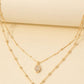 Layered Necklace with Circular and Oval CZ Charms